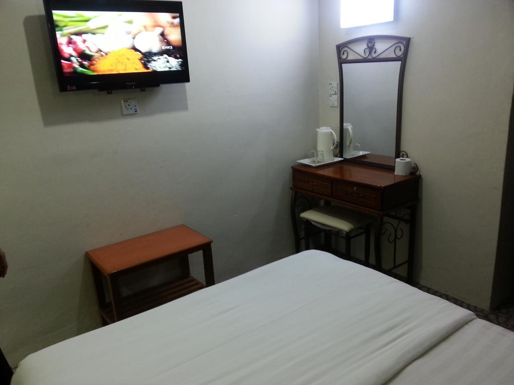 Oriental Inn Кучинг Номер фото