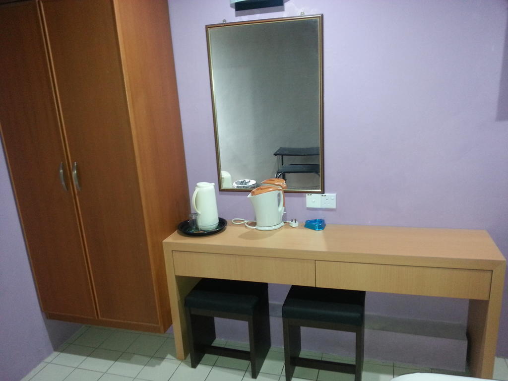 Oriental Inn Кучинг Номер фото